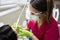 Dentist cleaning teeth of woman