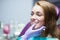 Dentist curing a woman patient