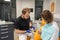 dentist discusses dental problems with a female patient in a dental clinic.