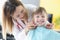 Dentist doctor examine teeth of little girl