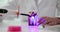 Dentist doctor holding tooth and dental UV lamp