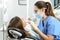 Dentist examining a patient teeth