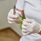 Dentist hands holding children tooth braces