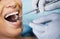 Dentist, healthcare and hands, patient mouth and medical tools, surgery and dental health. Tooth decay, orthodontics