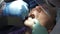 The dentist and his assistant treat the patient. Dental treatment in modern dentistry. A close-up shot of a patient in a