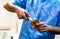 Dentist holding a dental curing lamp closeup