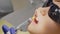 Dentist makes anesthetic injection to a little boy