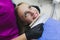 Dentist makes the process of treatment in dental clinic office.