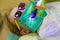 Dentist performing dental filling procedure to preteen girl in pediatric dental clinic. Doctor removing caries using