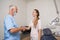 Dentist shaking hands with his patient