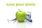 Dentist tools with green apple toothbrush and floss isolate on white background.- Image