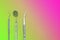 Dentist tools: mirror, dental probe and tweezers on pink green gradient background