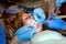 Dentist Working on the Teeth of a Little Girl
