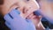 Dentistry. Dentist examines baby little teeth. Close up