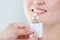 Dentistry. matching colour of the tooth enamel with whitening chart