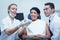 Dentists showing woman prosthesis teeth