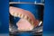 Denture in water glass