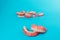 Dentures on a blue background. Close-up of dentures. Full removable plastic denture of the jaws. Prosthetic dentistry. False teeth