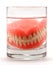 Dentures in the glass