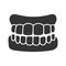 Dentures glyph icon