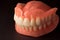 dentures. Isolate on white background acrylic prosthesis of human jaws. The concept of orthopedic dentistry