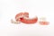 Dentures on a white background. Close-up of dentures. Full removable plastic denture of the jaws. Prosthetic dentistry.