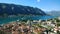 Departing from the pier, cruise ship and views of Kotorska red roofs. Boko-Kotor Bay