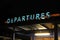 Departures Sign at Night