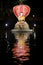 Depiction of the Buddha in meditation, reflected in the Muchalinda Sarovar Lake, Mahabodhi Temple, protected by the Naga King