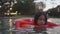 Depressed Asian girl is floating on water in a swimming pool with sad expression.