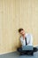 Depressed Businessman sitting on floor at his office. Hard work