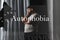 Depressed overweight man alone. Autophobia