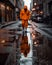 depressed person in an orange jacket walking in a rainy street