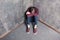 Depressed teenage boy sitting on floor