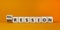 Depression or regression symbol. Turned cubes and changed the word `depression` to `regression`. Beautiful orange background.