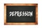 DEPRESSION text written on wooden frame school blackboard