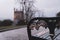 A depth of field shot of ornate decorated leaves on a park bench, With a priory in the background, Malvern, Worcestershire, UK