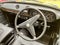 Derbyshire, England, July 10, 2021. Interior of classic Ford Escort Car. Steering wheel and dials.