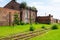 Derelict building and overgrown train tracks Birkenhead Docks Wirral August 2019