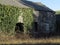 Derelict farm building, colour image.