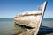 Derelict oyster boat on beach