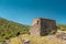 Derelict stone farm building in Balagne region of Corsica