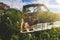 Derelict vehicles left to rust in a field in the countryside