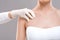 Dermatologist examining birthmark on woman body, cropped