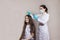 A dermatologist or trichologist applies a dandruff or lice weed to the patient& x27;s hair. Treating psoriasis, hair loss