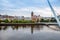 Derry, Ireland. Illuminated Peace bridge in Derry Londonderry, City of Culture, in Northern Ireland with city center at