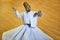 Dervish spirituality dancer in Mevlana culture center. Sema. Konya, Turkey