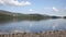 Derwent Water Lake District uk south of Keswick blue sky beautiful calm sunny summer day PAN