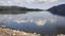 Derwent Water Lake District uk south of Keswick blue sky beautiful calm sunny summer day PAN