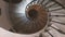 Descending along an ancient spiral staircase